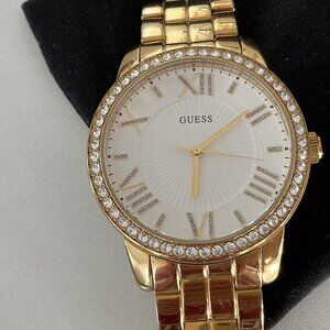 Guess gold tone watch with rhinestone bezel